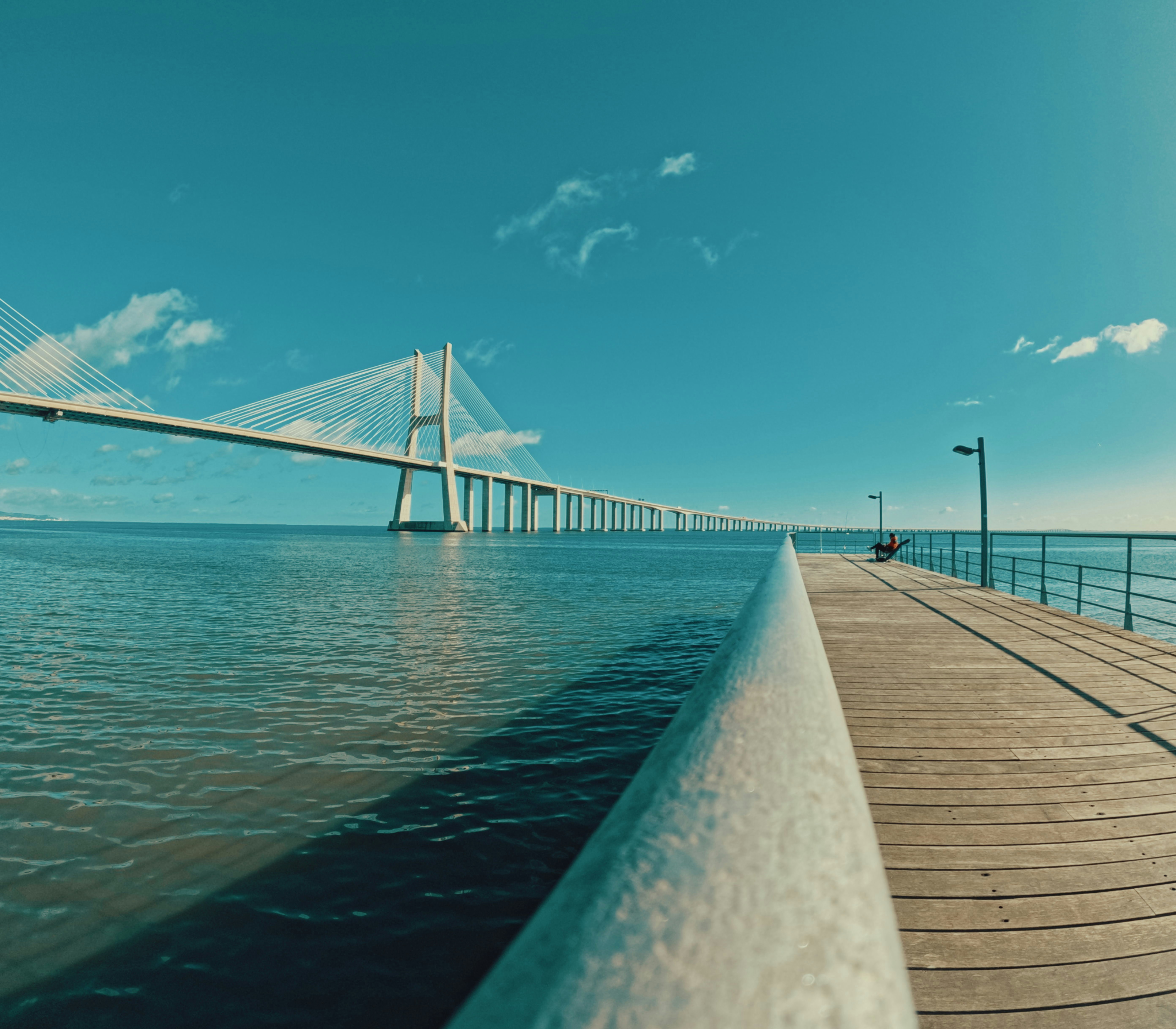 a view of a bridge over a body of water