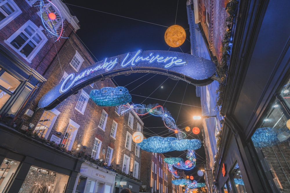 a street filled with lots of lights and decorations