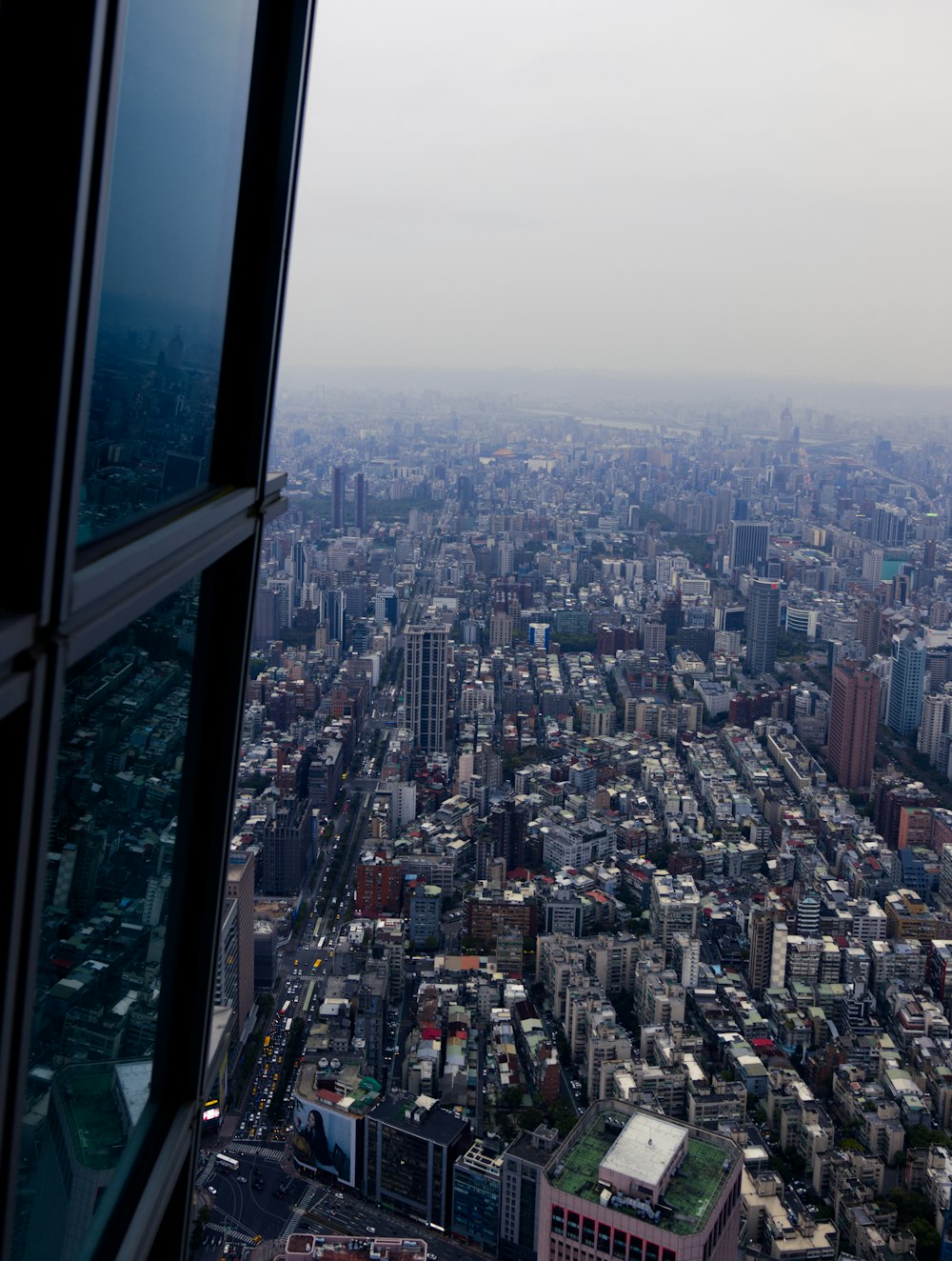 a view of a city from a tall building