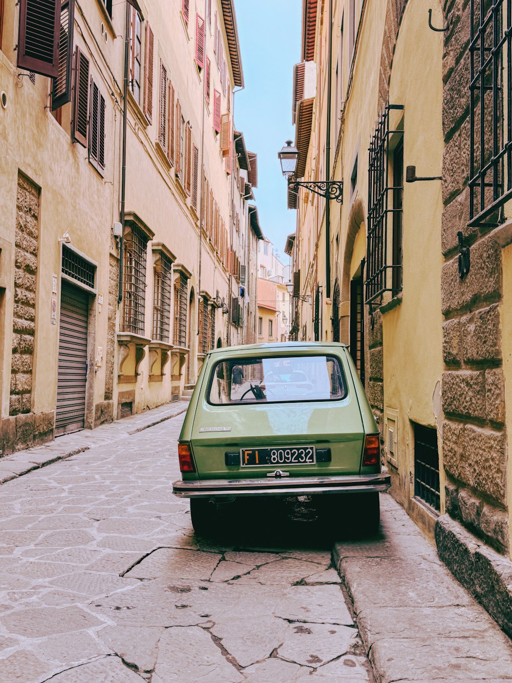 a car parked on the side of a street