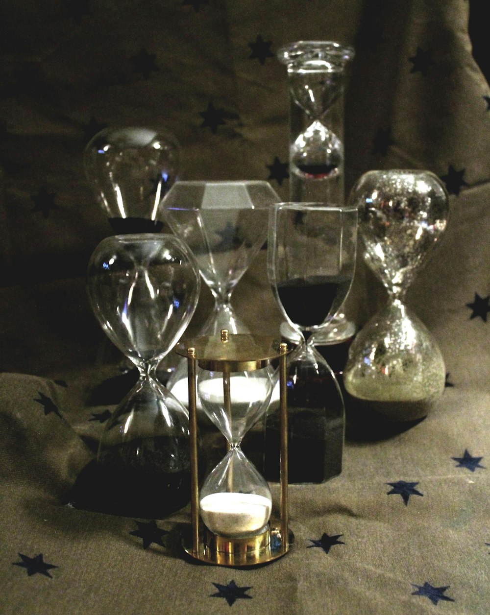 a group of glass items sitting on top of a table