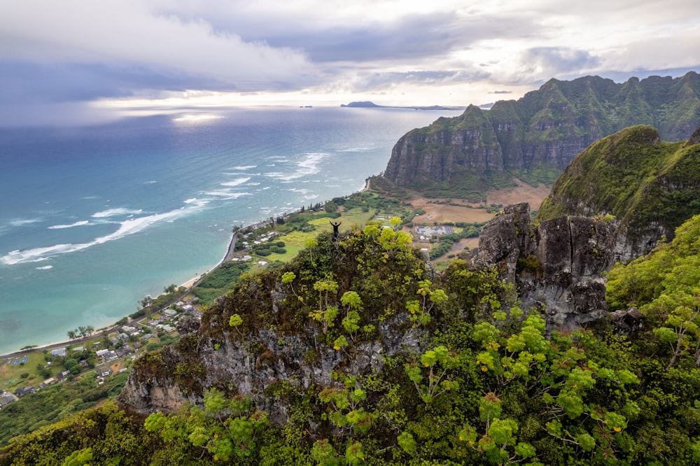 a scenic view of the ocean and mountains