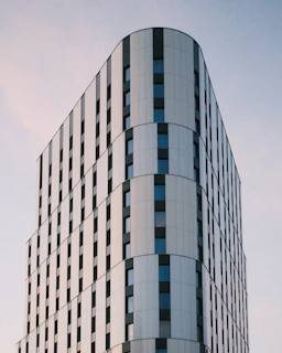 a very tall building with a clock on the side of it