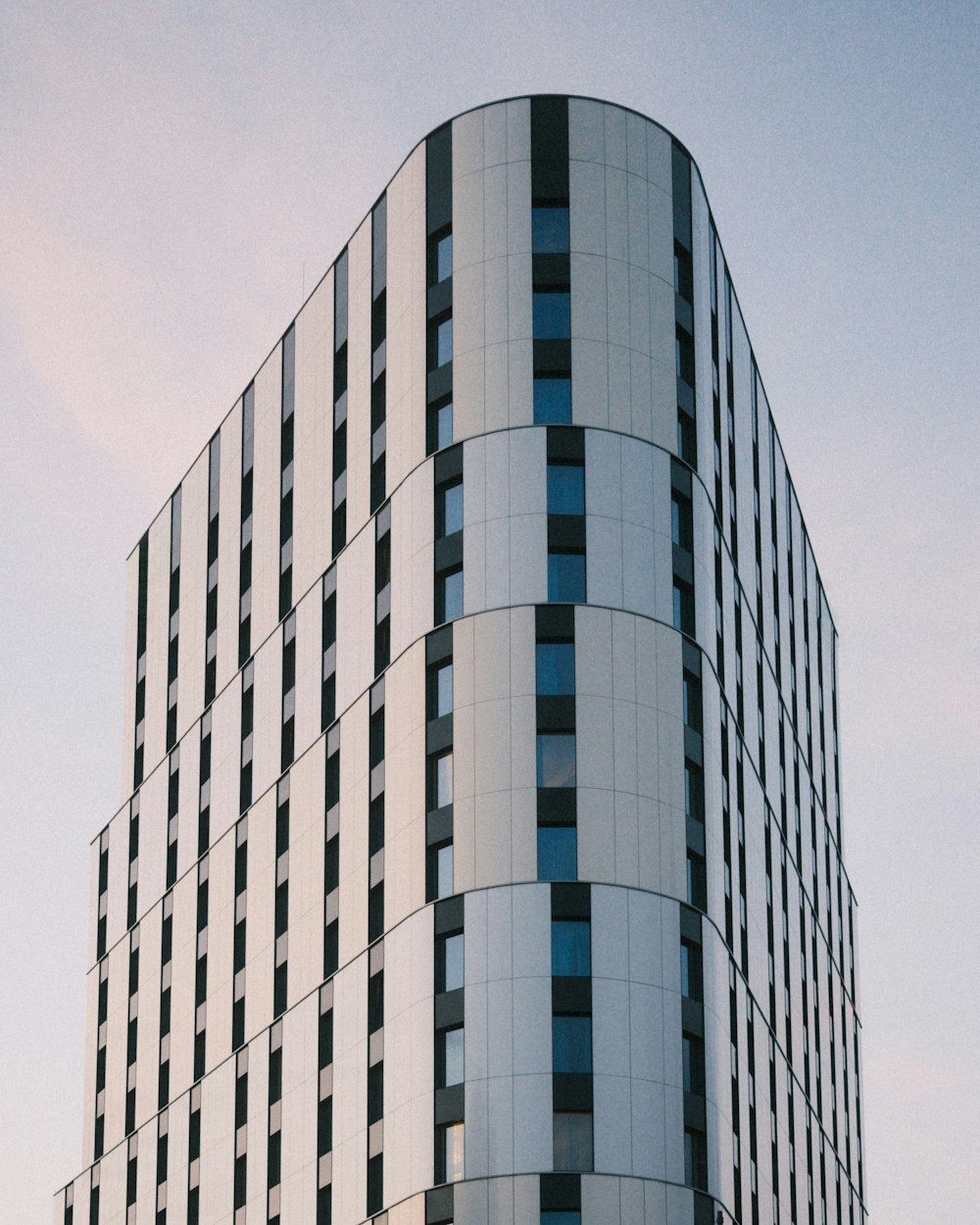 a very tall building with a clock on the side of it