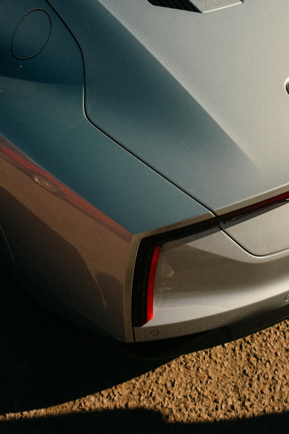 a close up of the tail end of a sports car