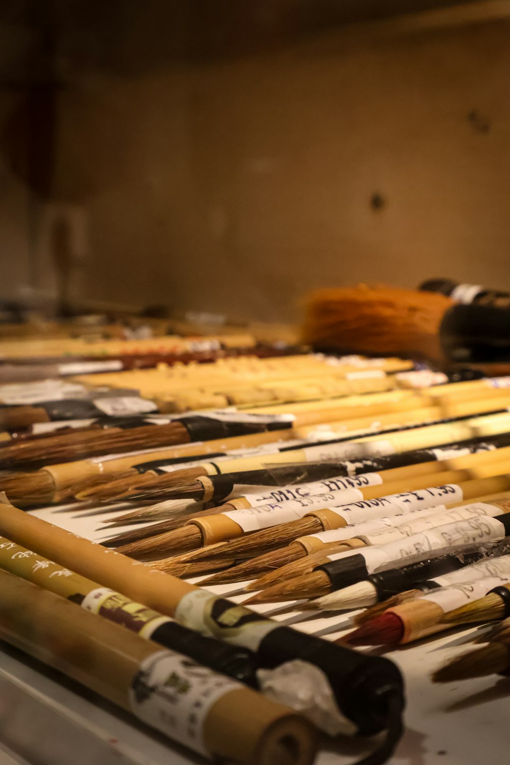 a bunch of baseball bats sitting on top of a table