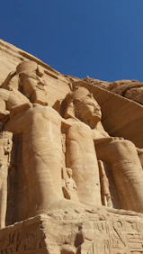 the statues of pharaohs and queens of egypt