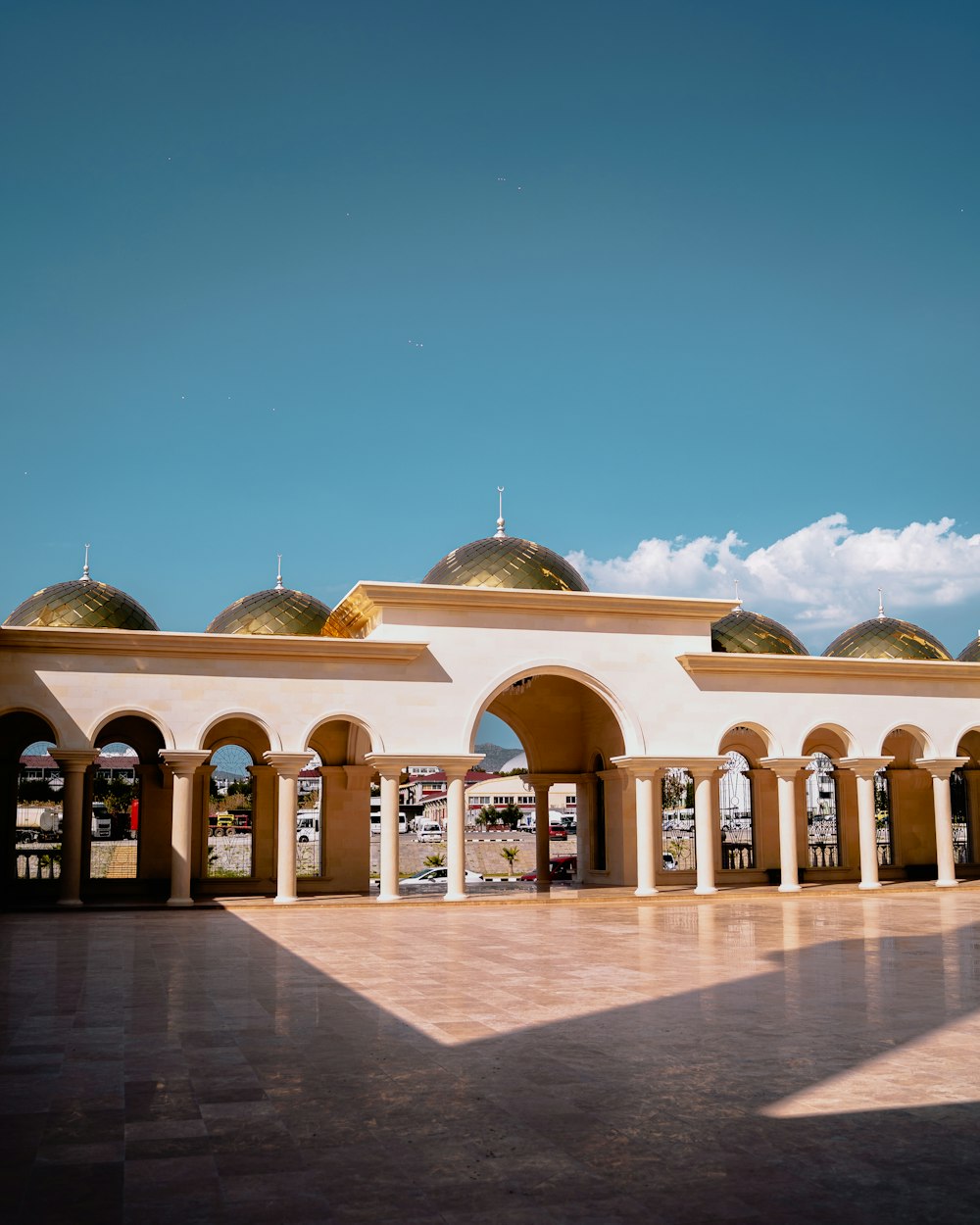 a large building with arches and domes on top of it