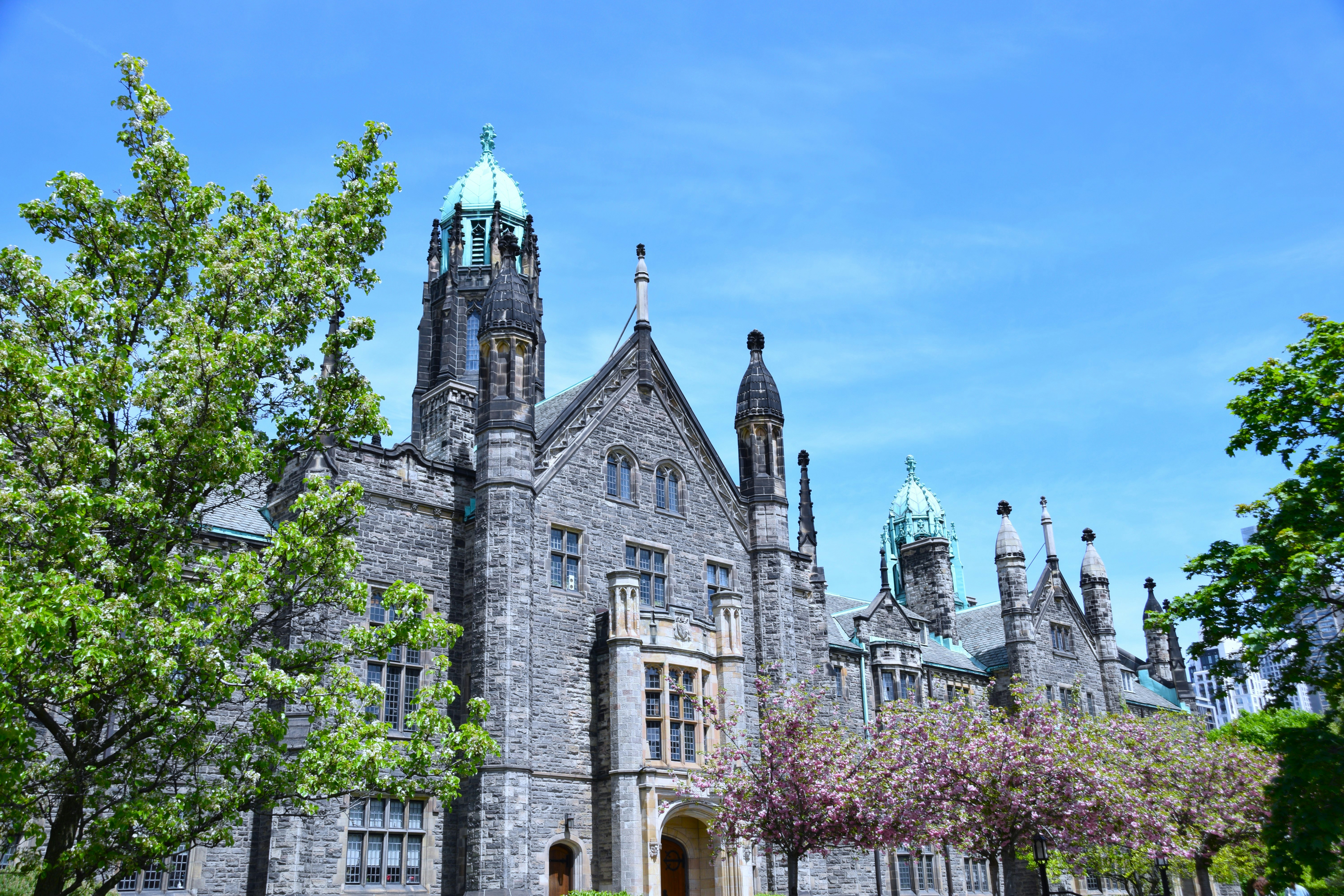 a large stone building with a clock tower
