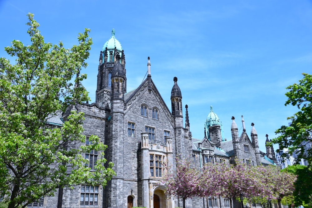 a large stone building with a clock tower