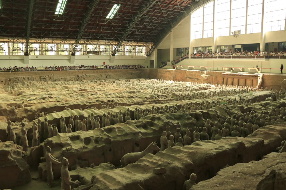 a large room filled with lots of stone blocks