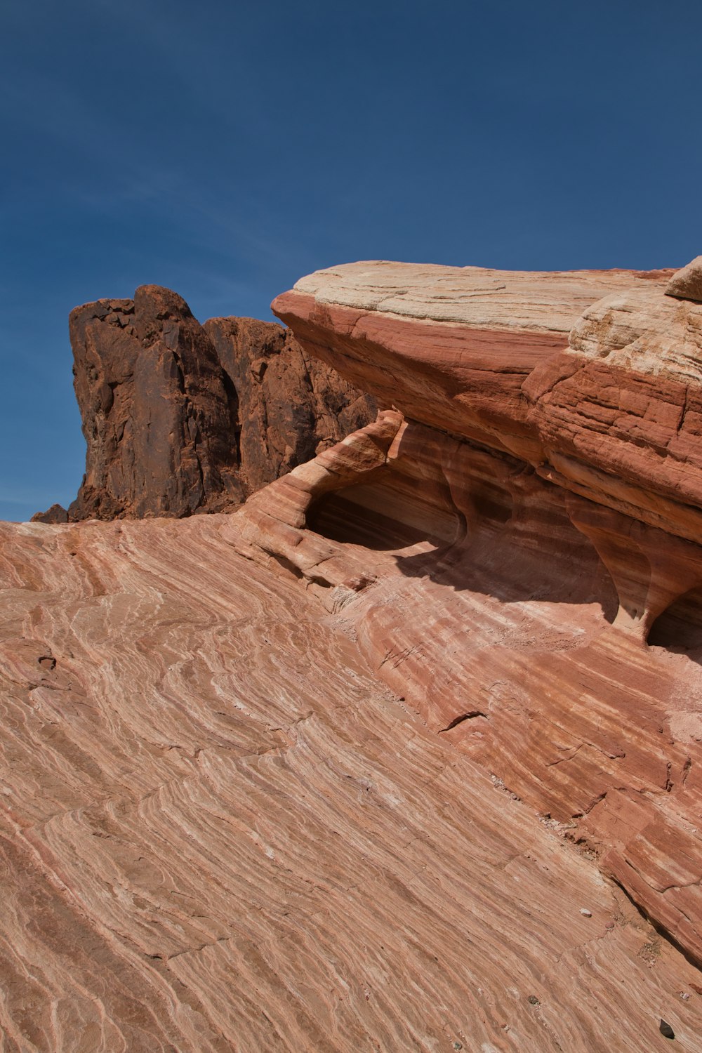 a rock formation in the middle of a desert