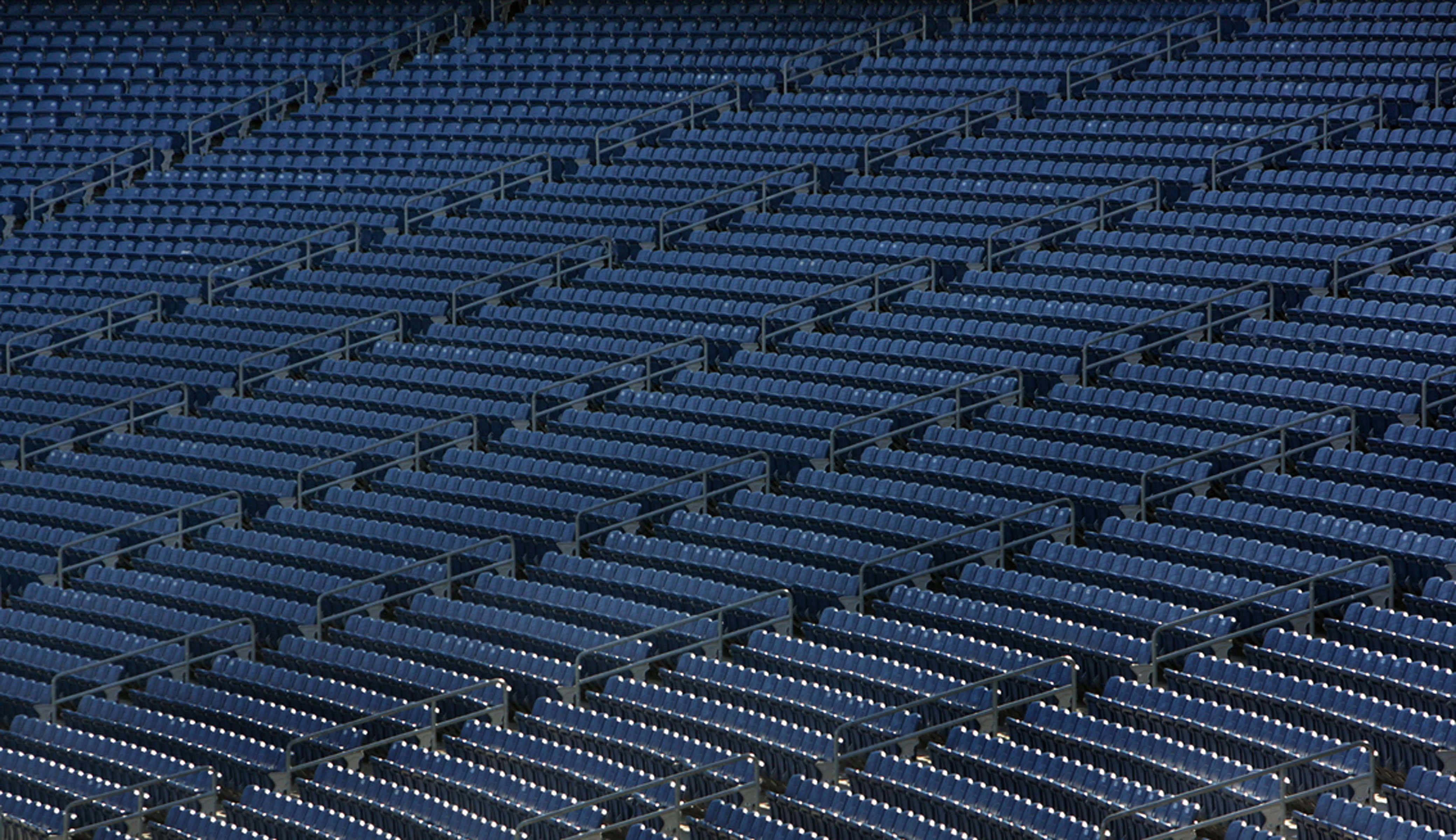 a tennis racket sitting on top of a tennis court