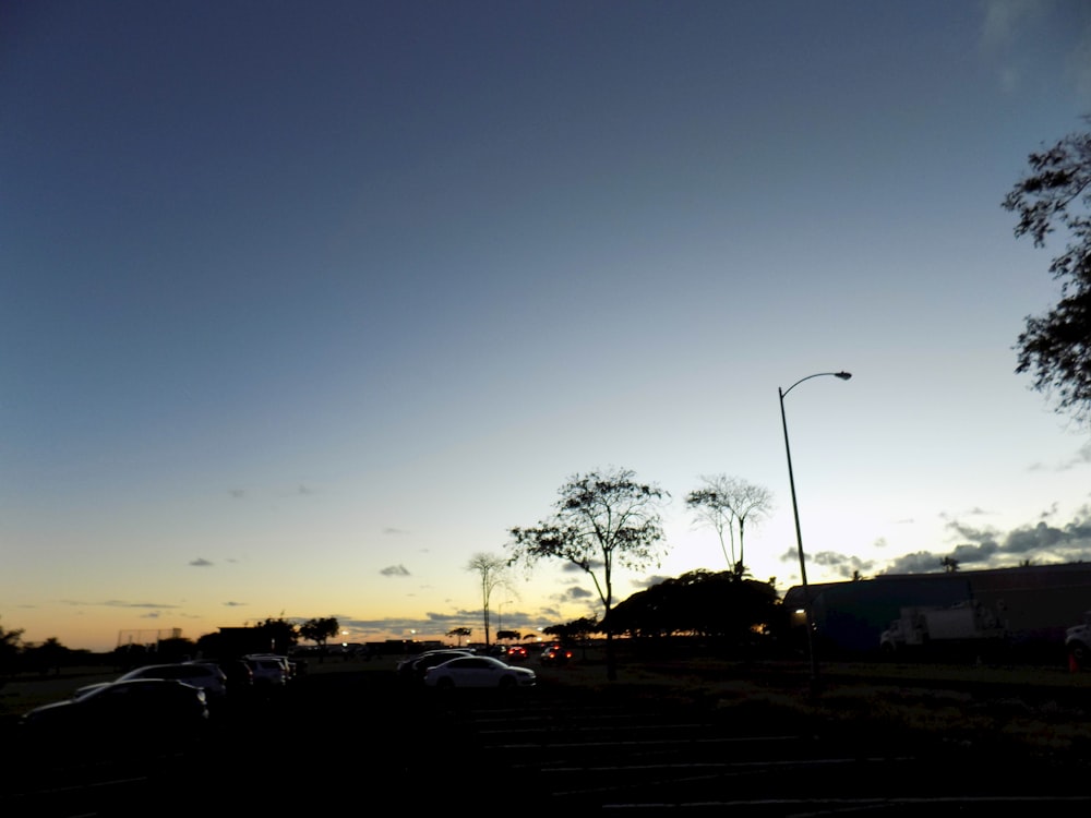 a parking lot filled with lots of parked cars