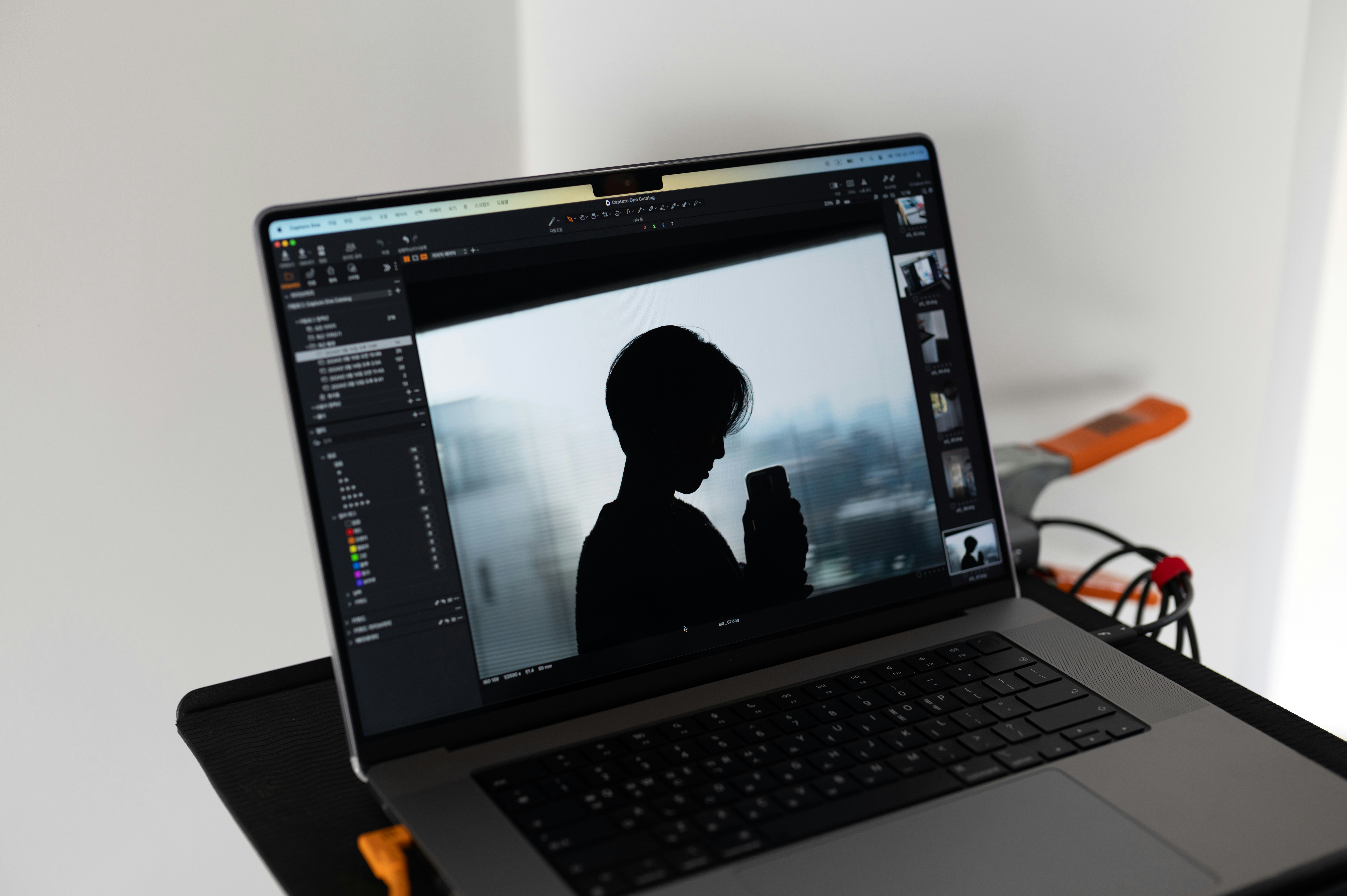 a laptop computer sitting on top of a desk