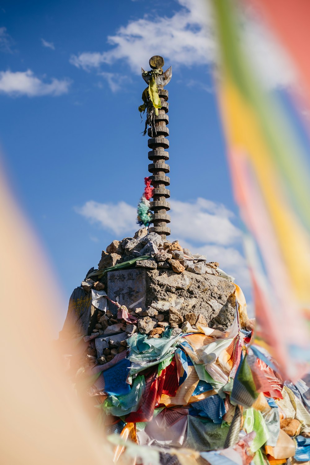 a man standing on top of a pile of trash