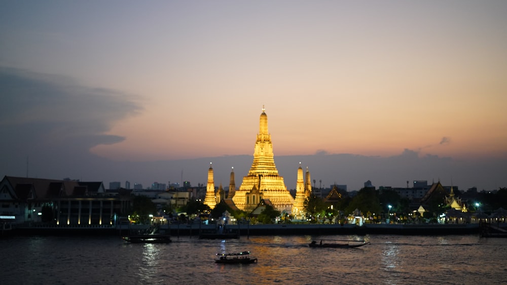 a large building sitting on top of a river