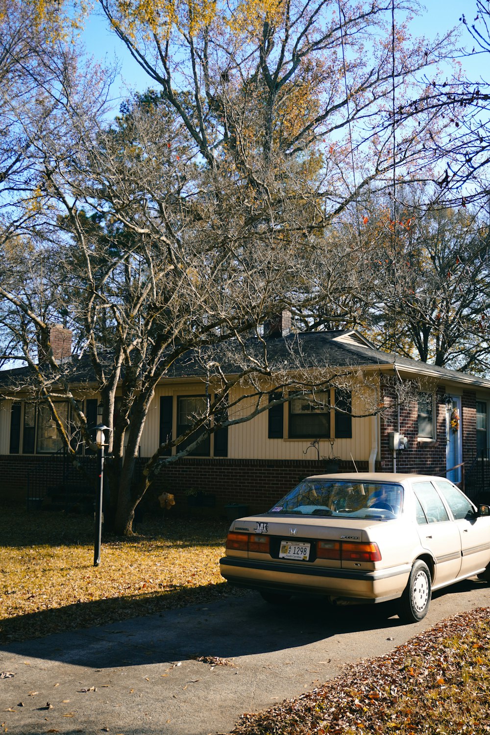 a car is parked in front of a house