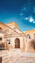 a stone building with steps leading up to it
