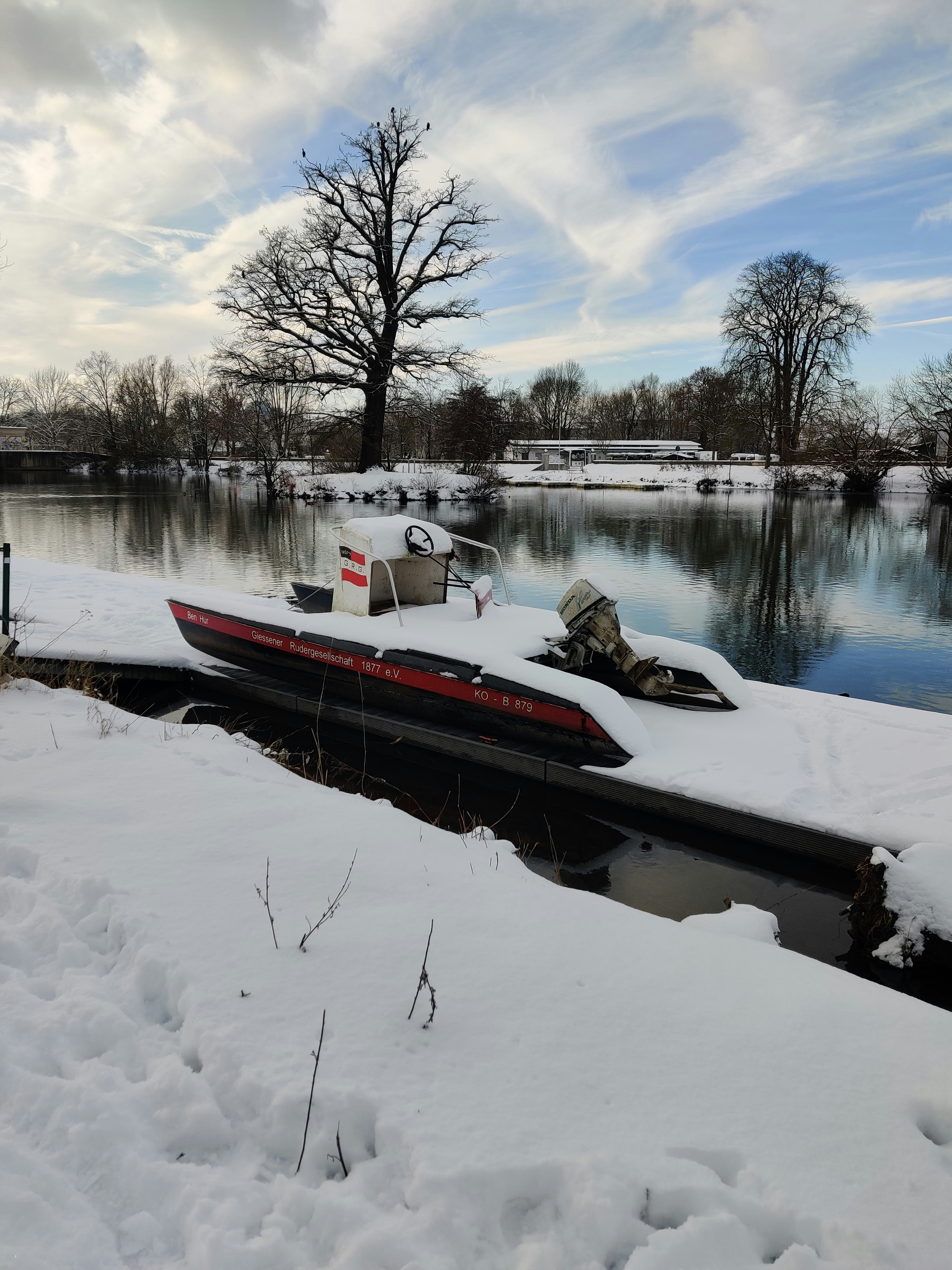 a boat that is sitting in the snow