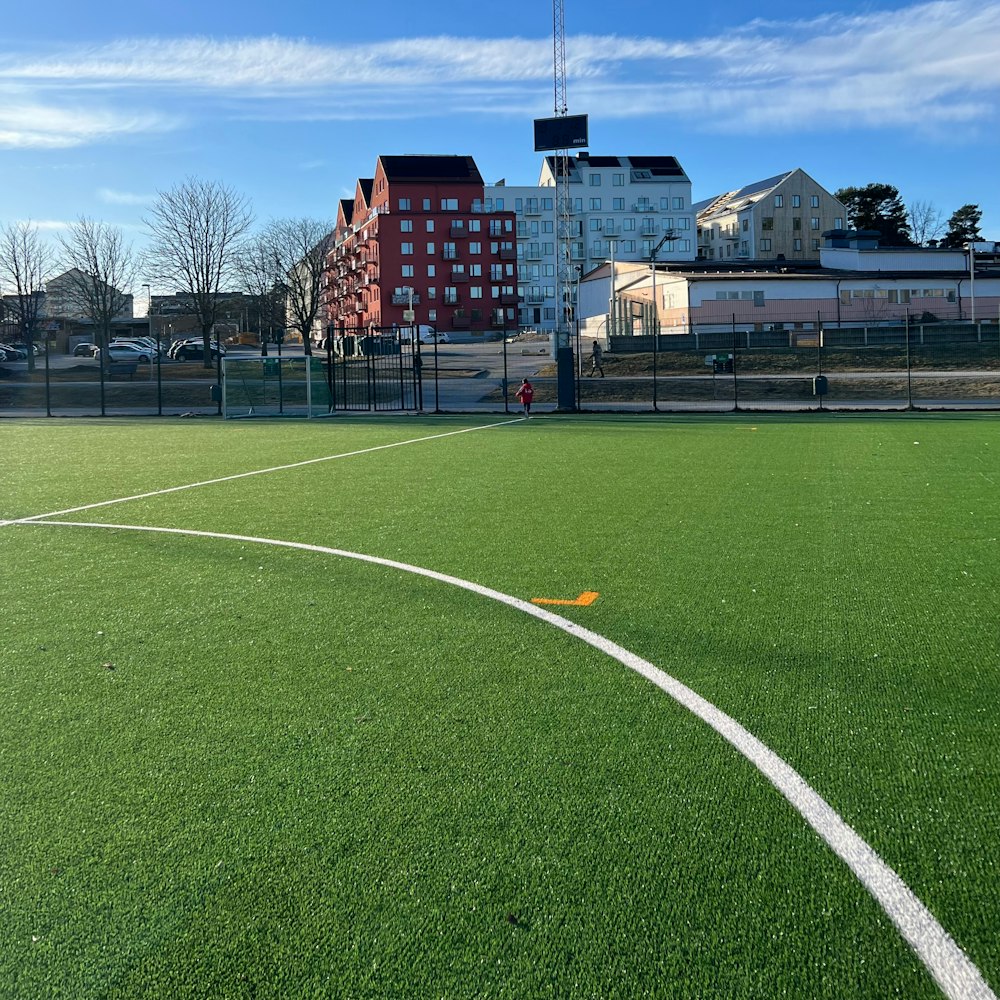 a soccer field with a white line on it