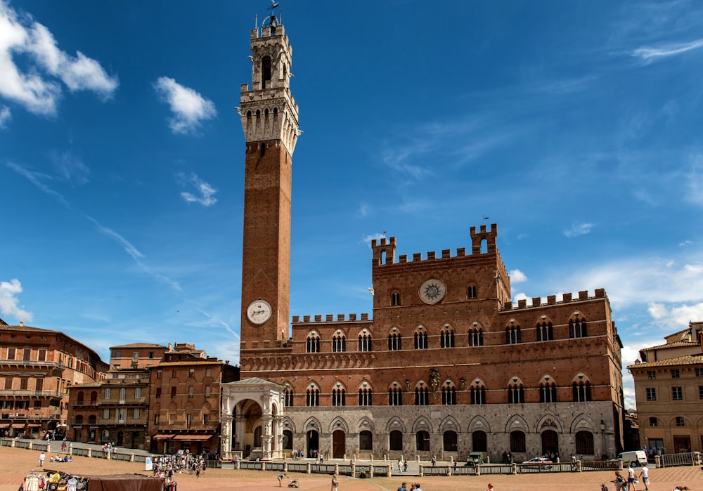 a tall brick building with a clock tower