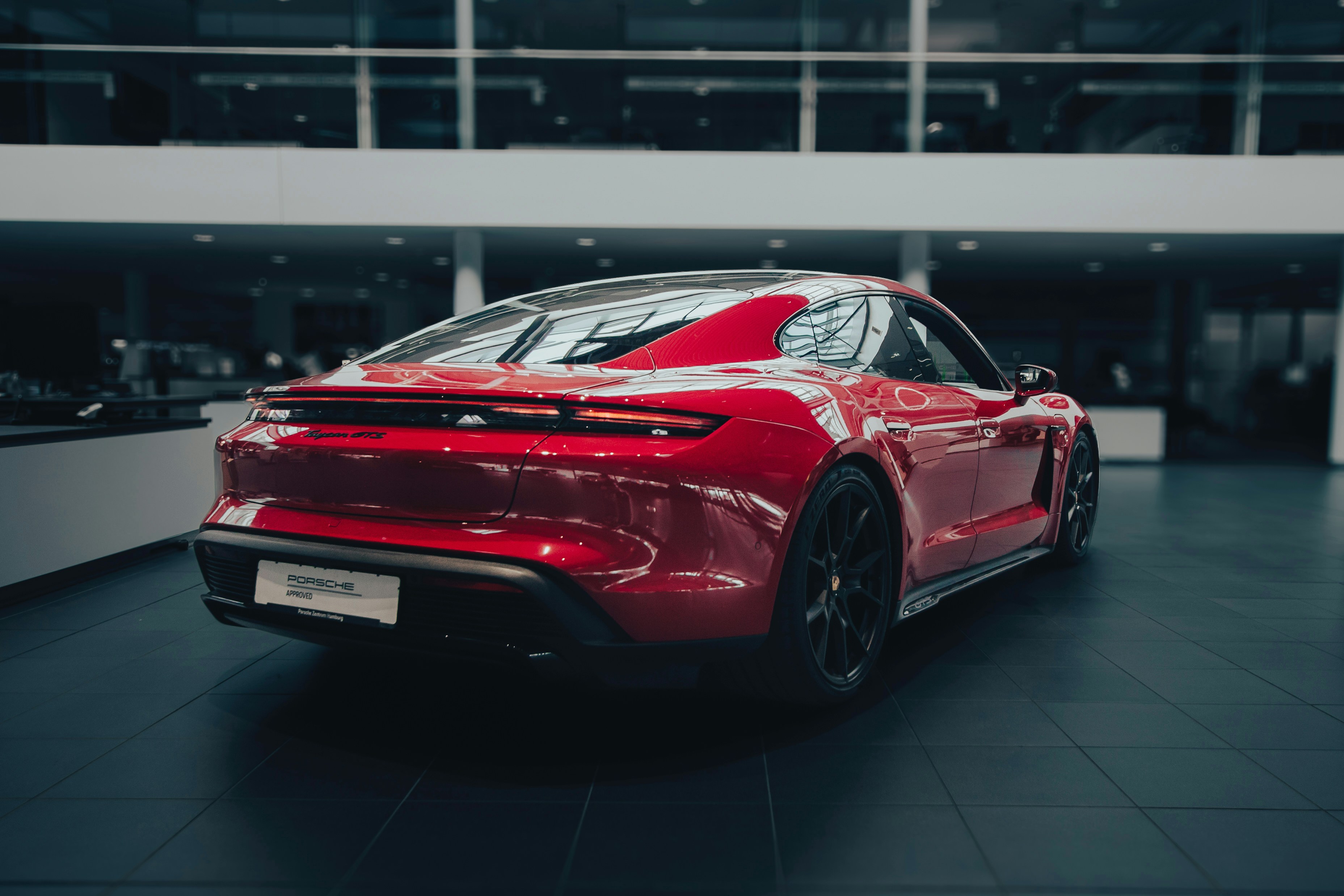 a red sports car parked in a building