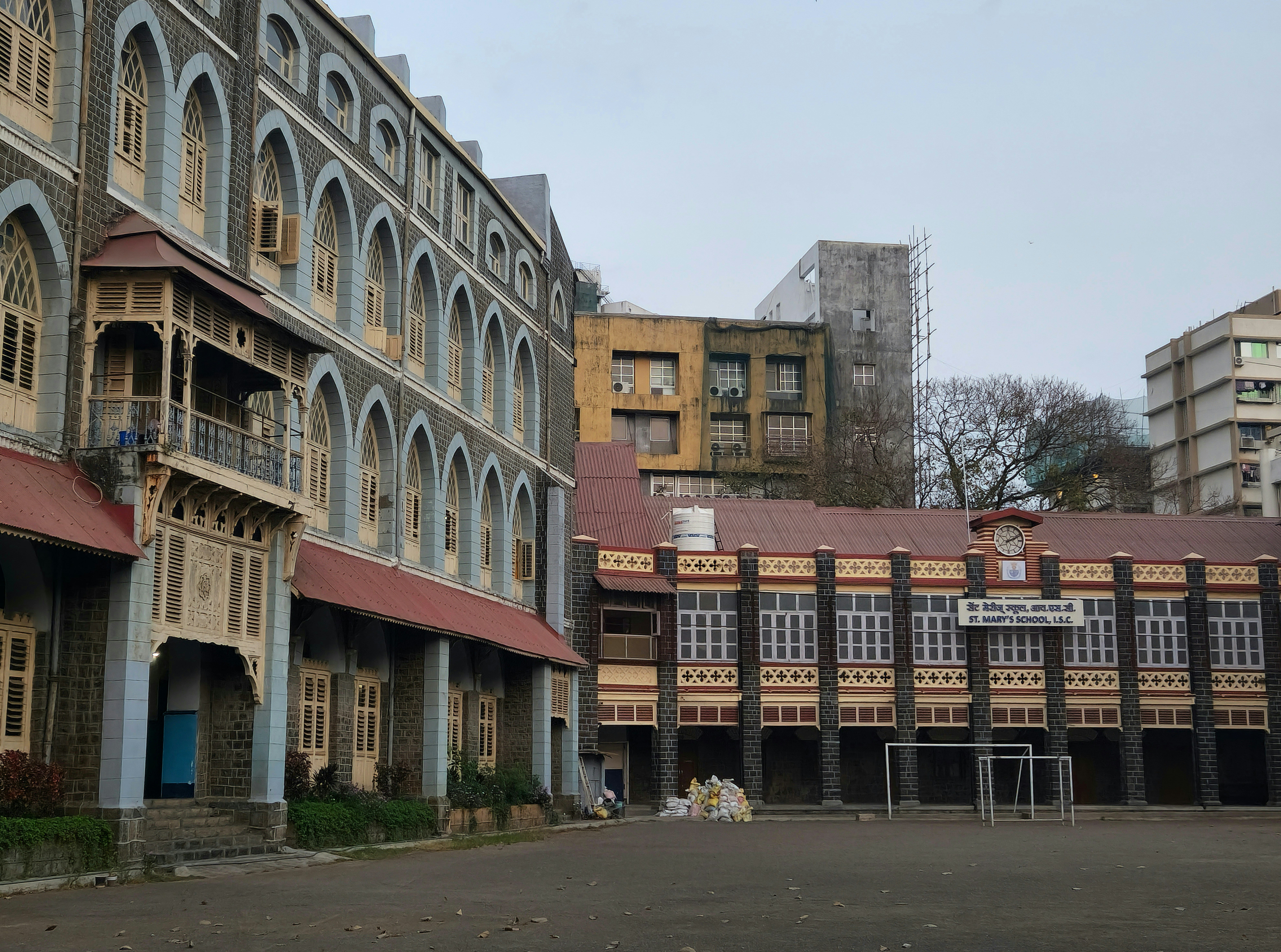 an old building with a lot of windows and balconies