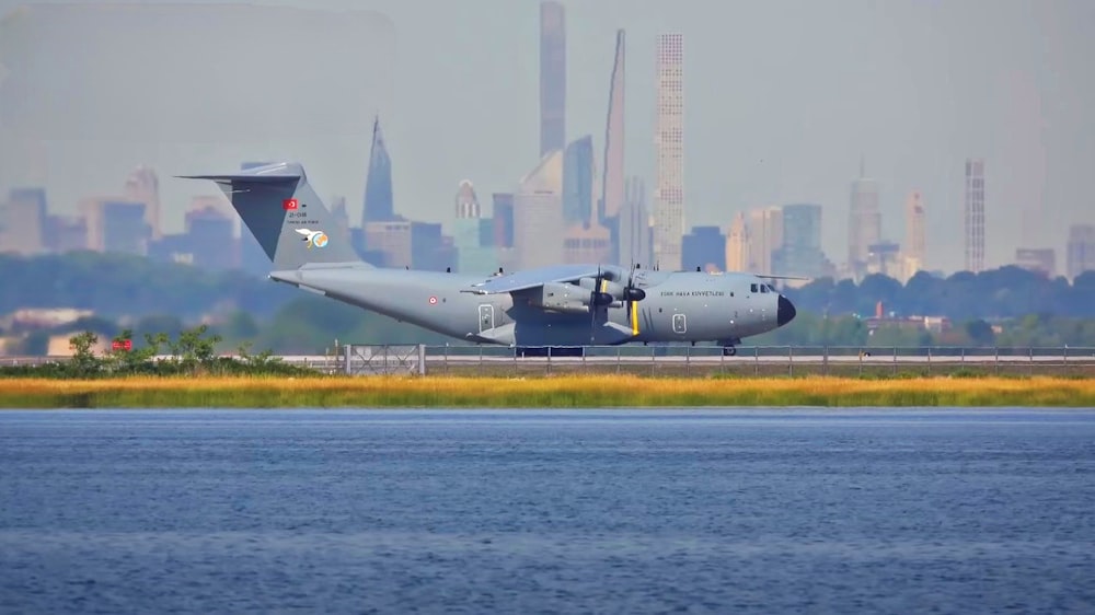 a large air plane sitting on top of an airport runway