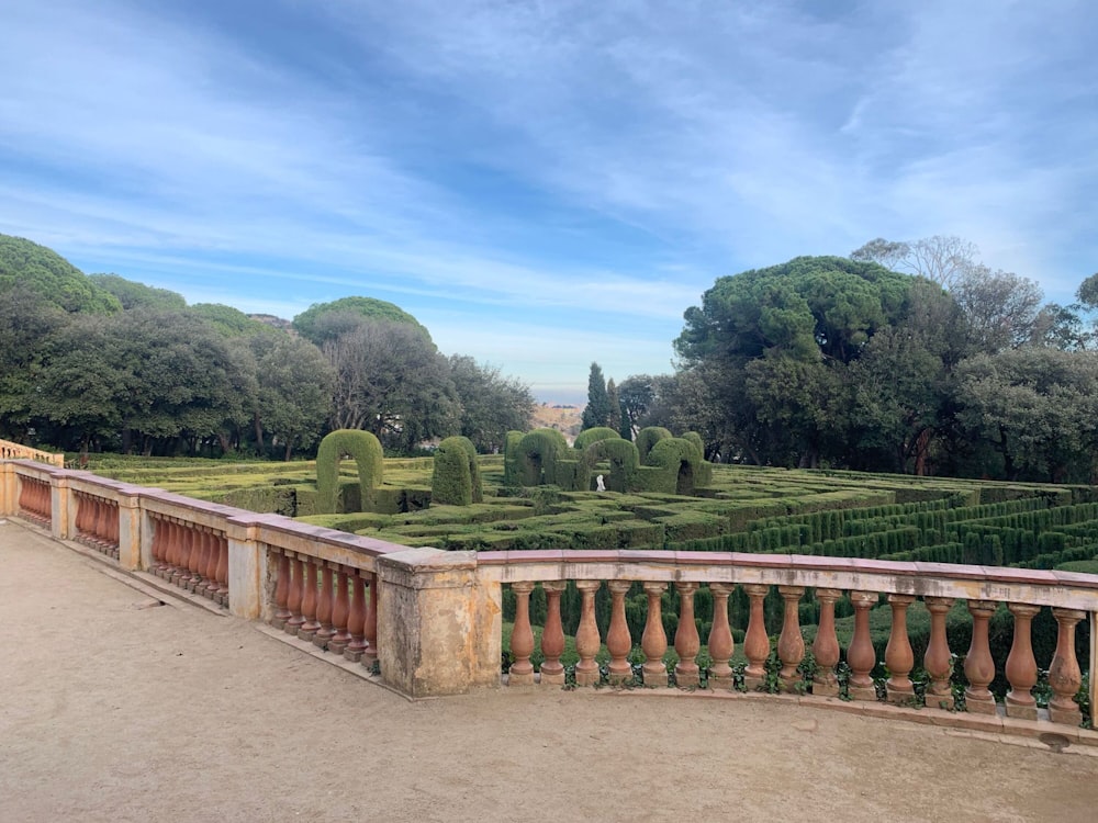 a view of a garden from a balcony