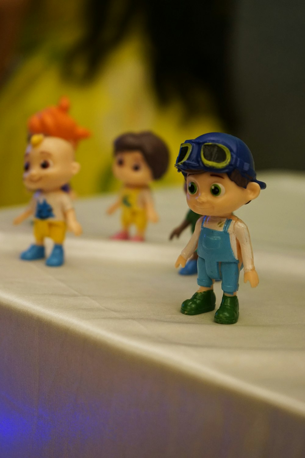 a group of toy figurines sitting on top of a table