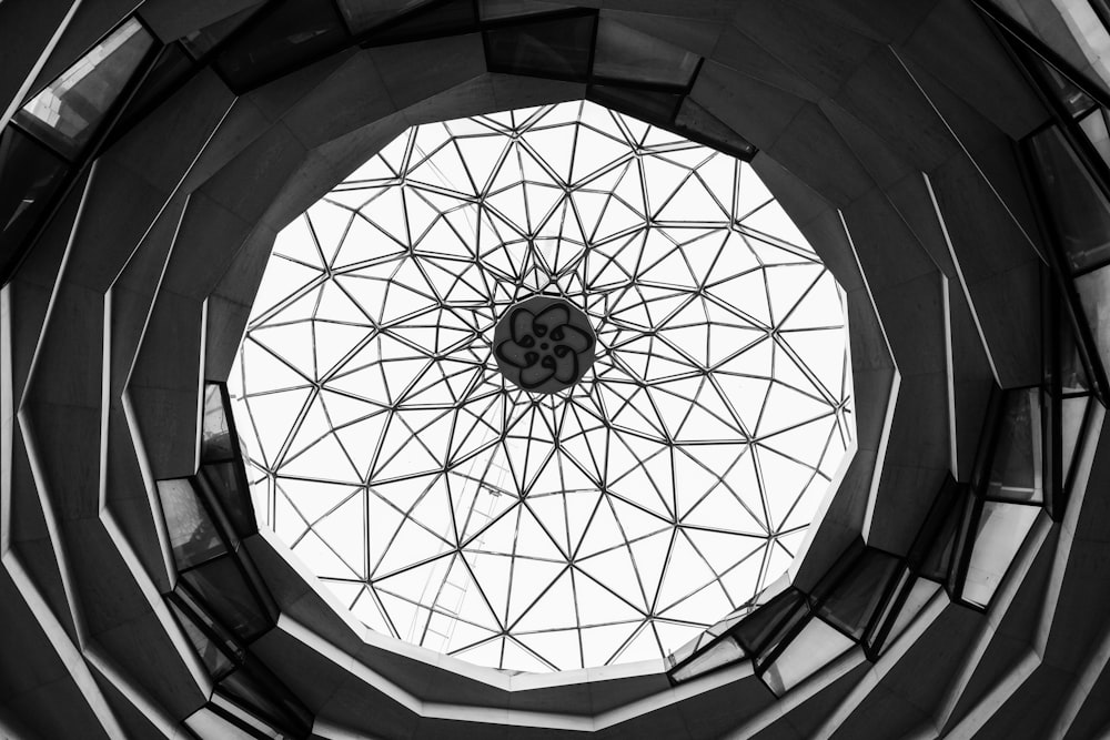 a view of the ceiling of a building from below