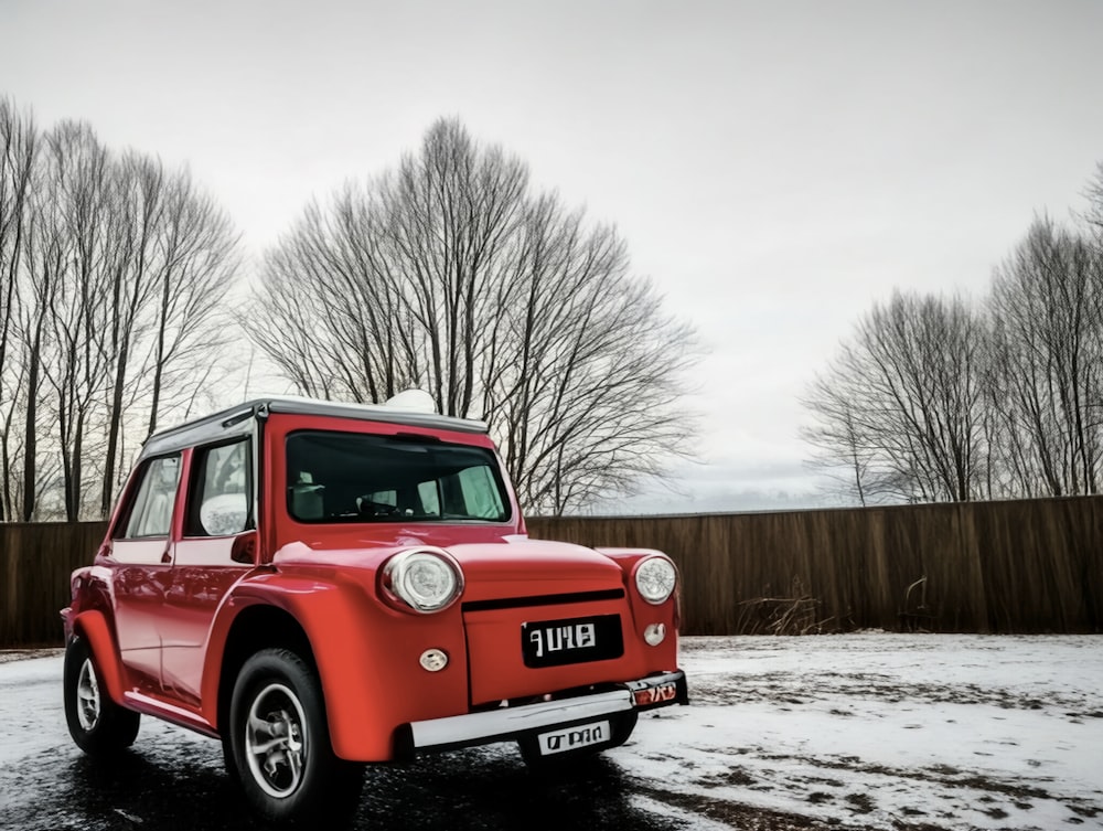 a small red car parked in a driveway