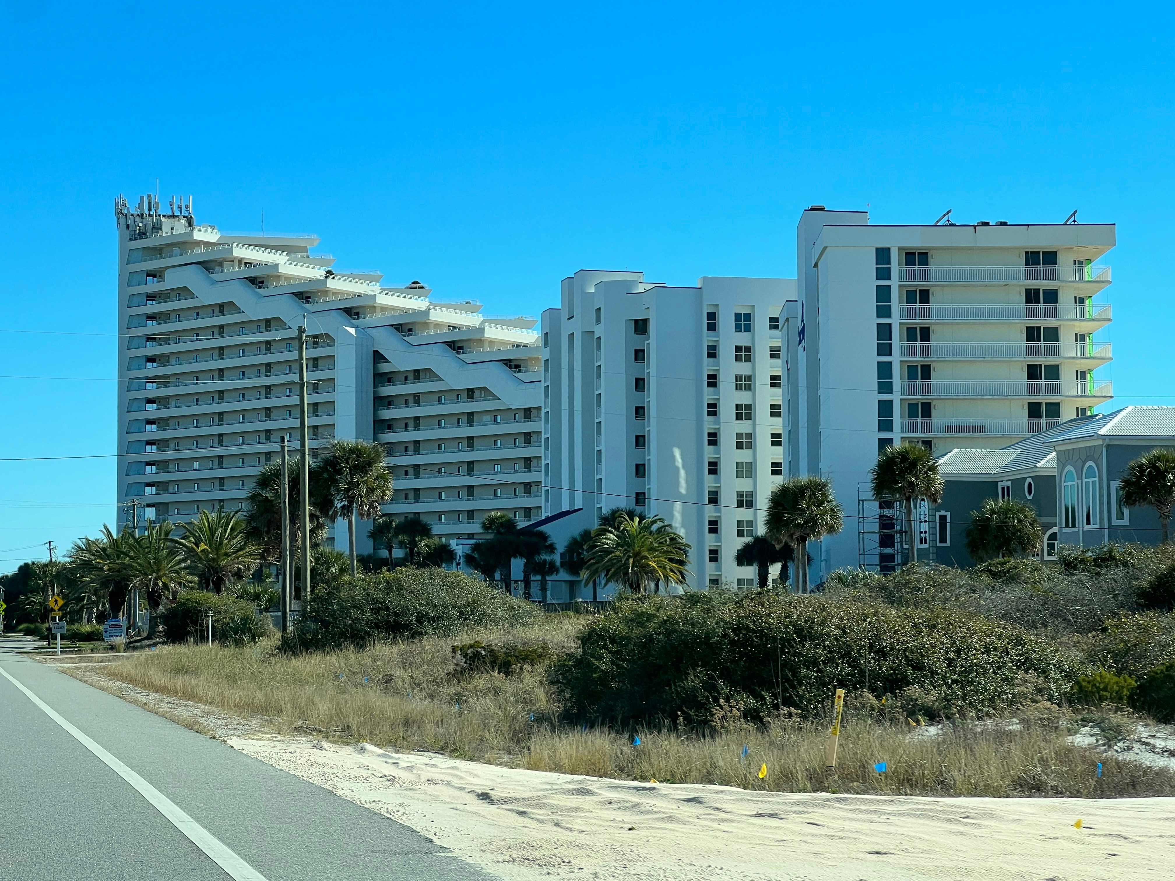 White luxury buildings on beachfront