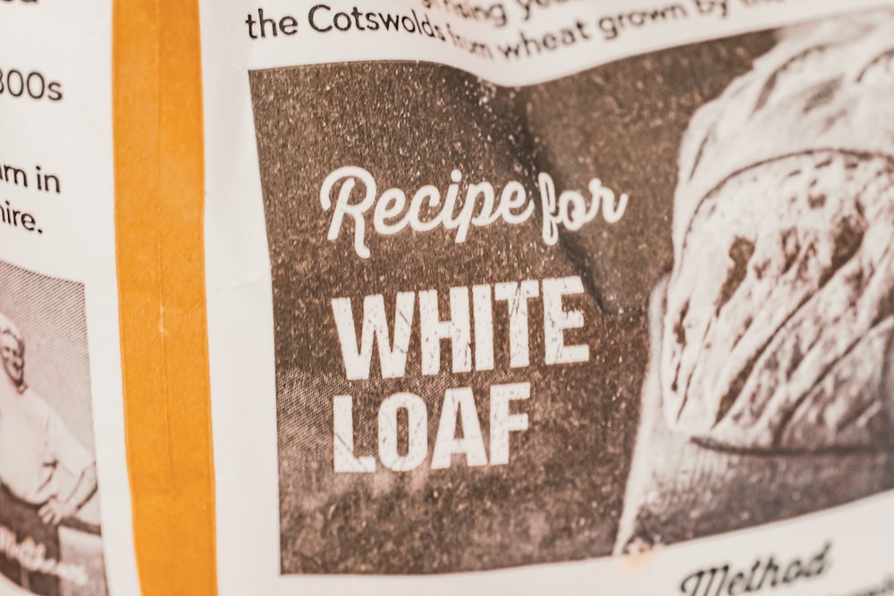 a newspaper with a recipe for white loaf on it