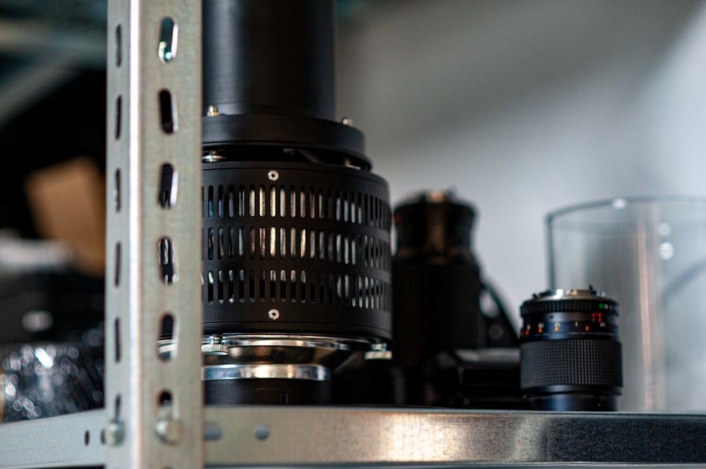 a close up of a camera on a shelf