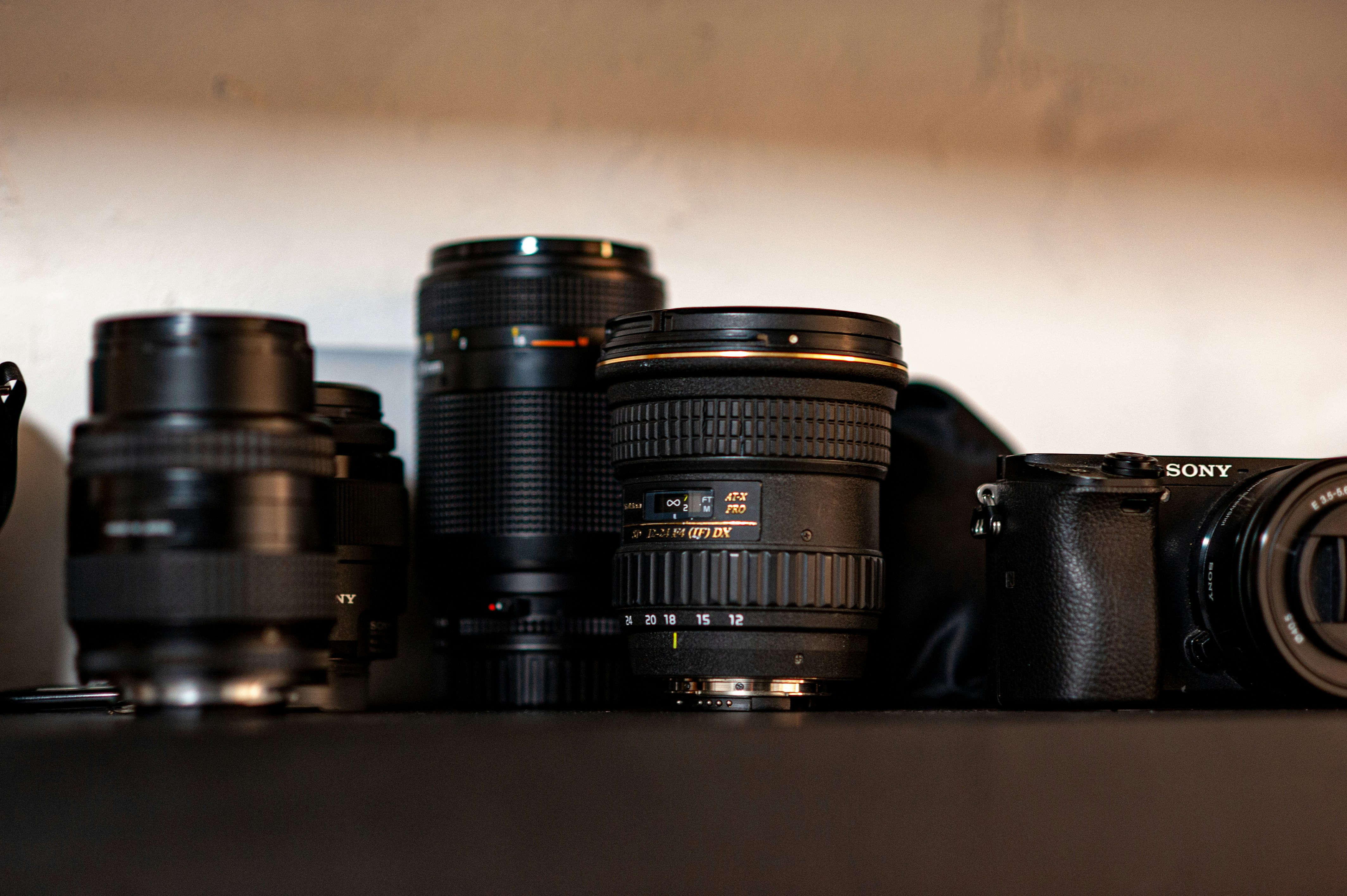 a group of cameras sitting on top of a table