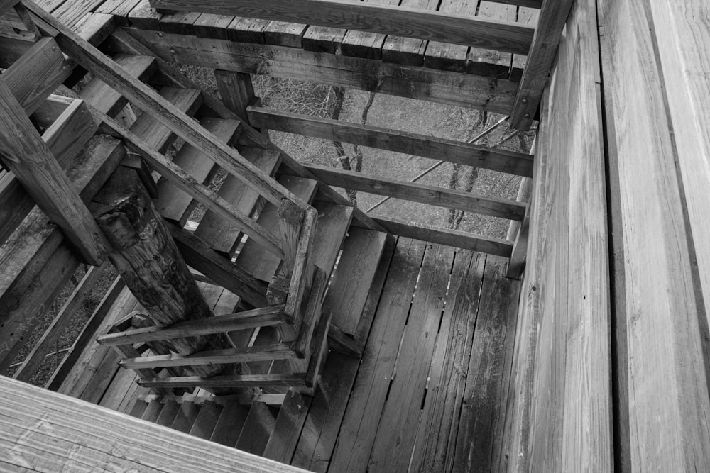 a black and white photo of a wooden structure