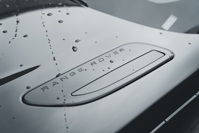 a close up of the hood of a sports car