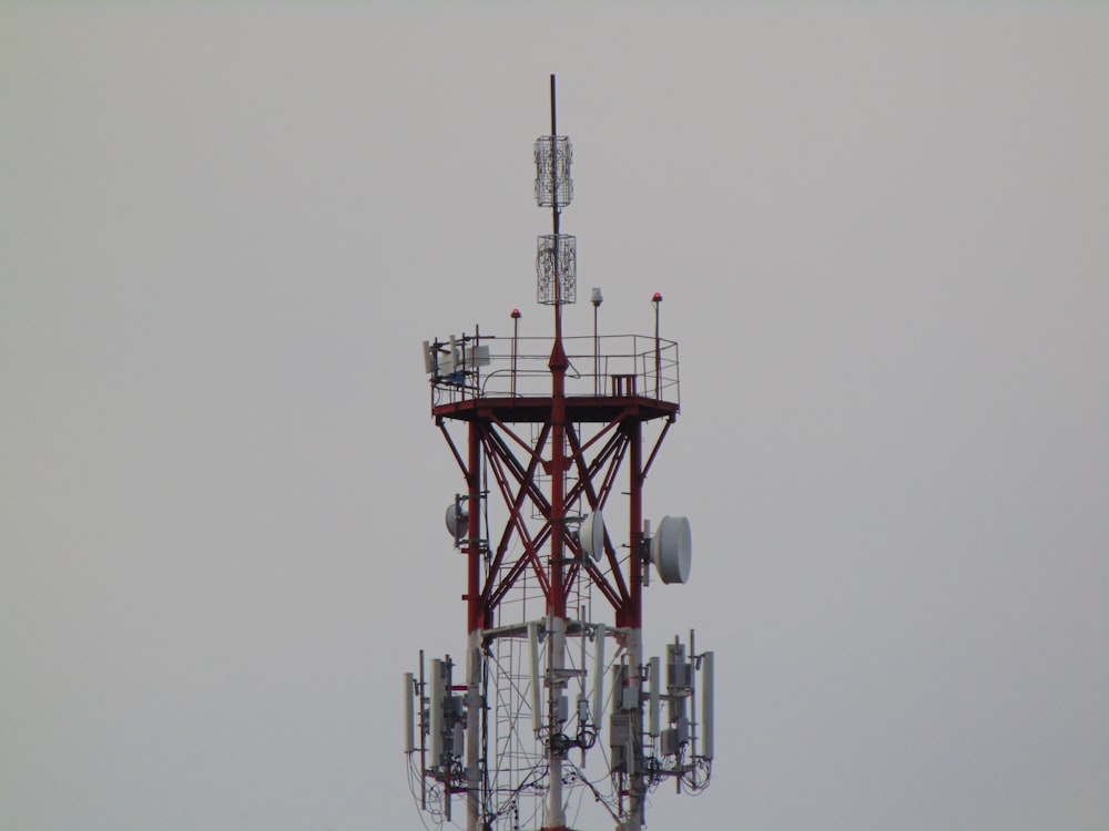 a tower with a lot of antennas on top of it
