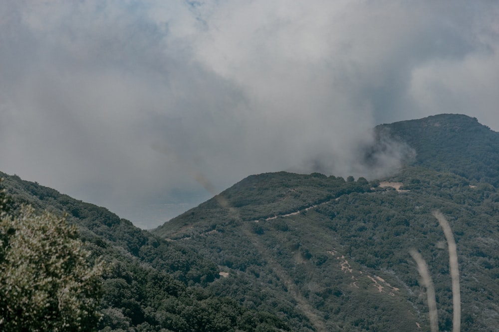 a view of a mountain with a road going through it