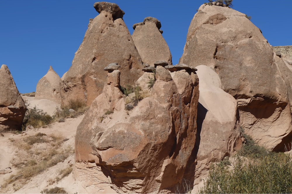 a group of large rocks in the desert