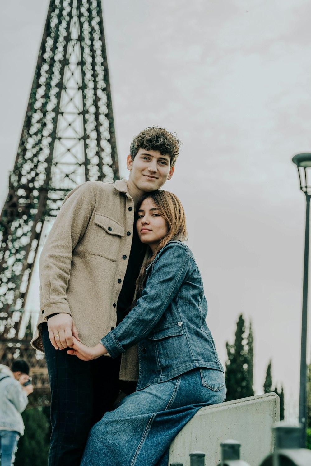 a man and a woman standing next to each other