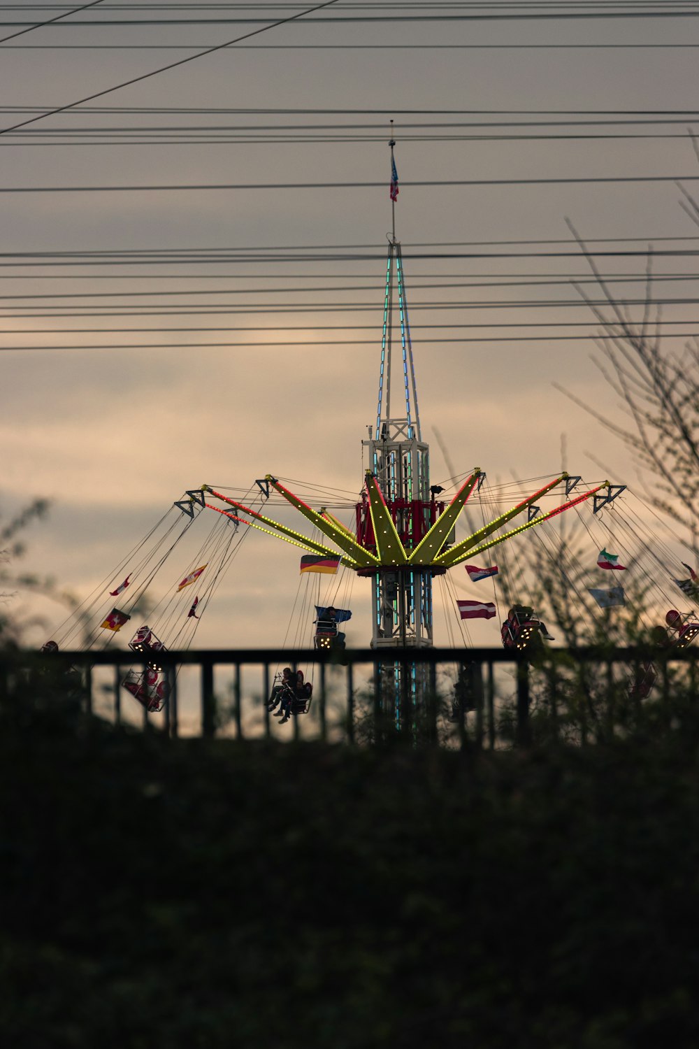 a carnival ride with a sky background