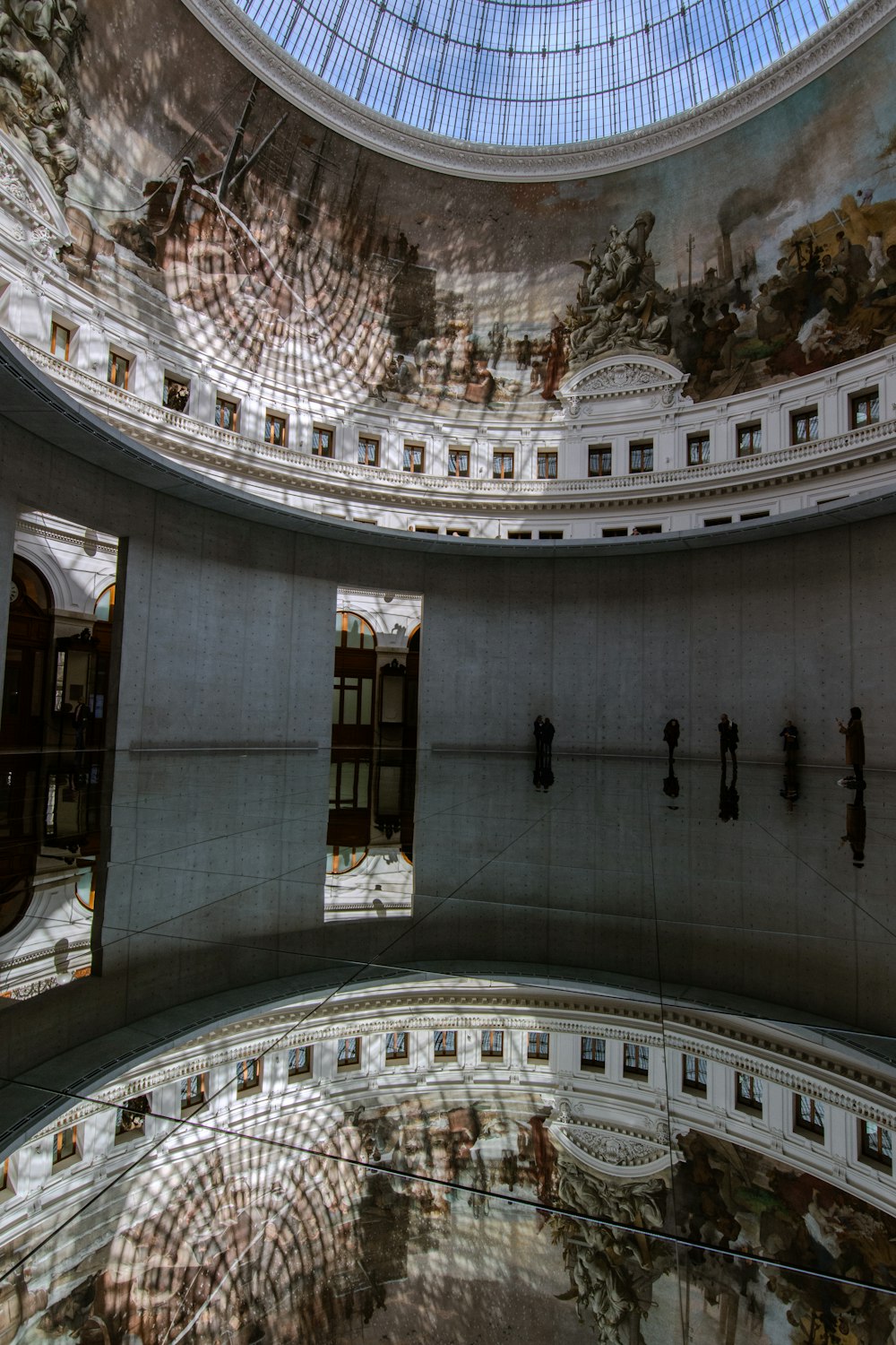 the ceiling of a building with a glass dome