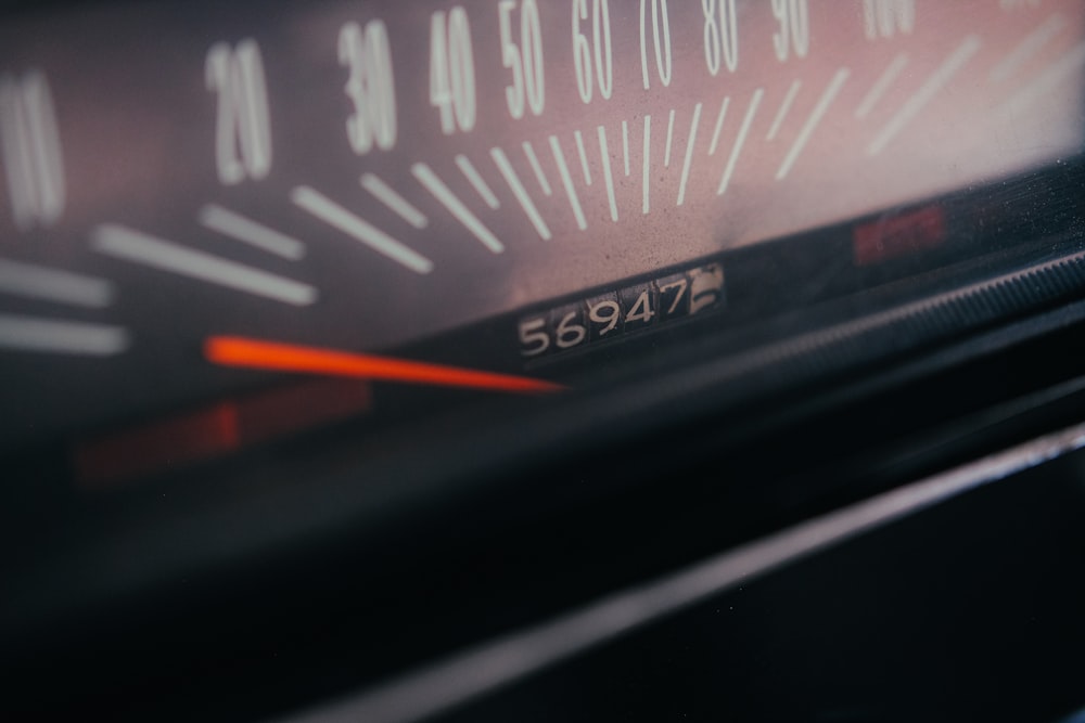 a close up of a speedometer on a car