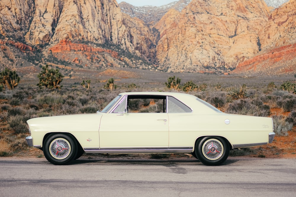 a white car parked on the side of the road