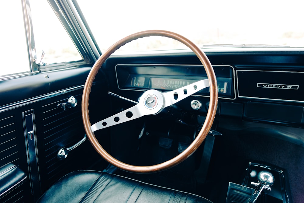 a steering wheel and dashboard of a car