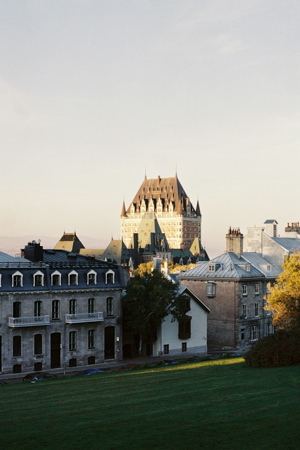 a view of a castle from across a field