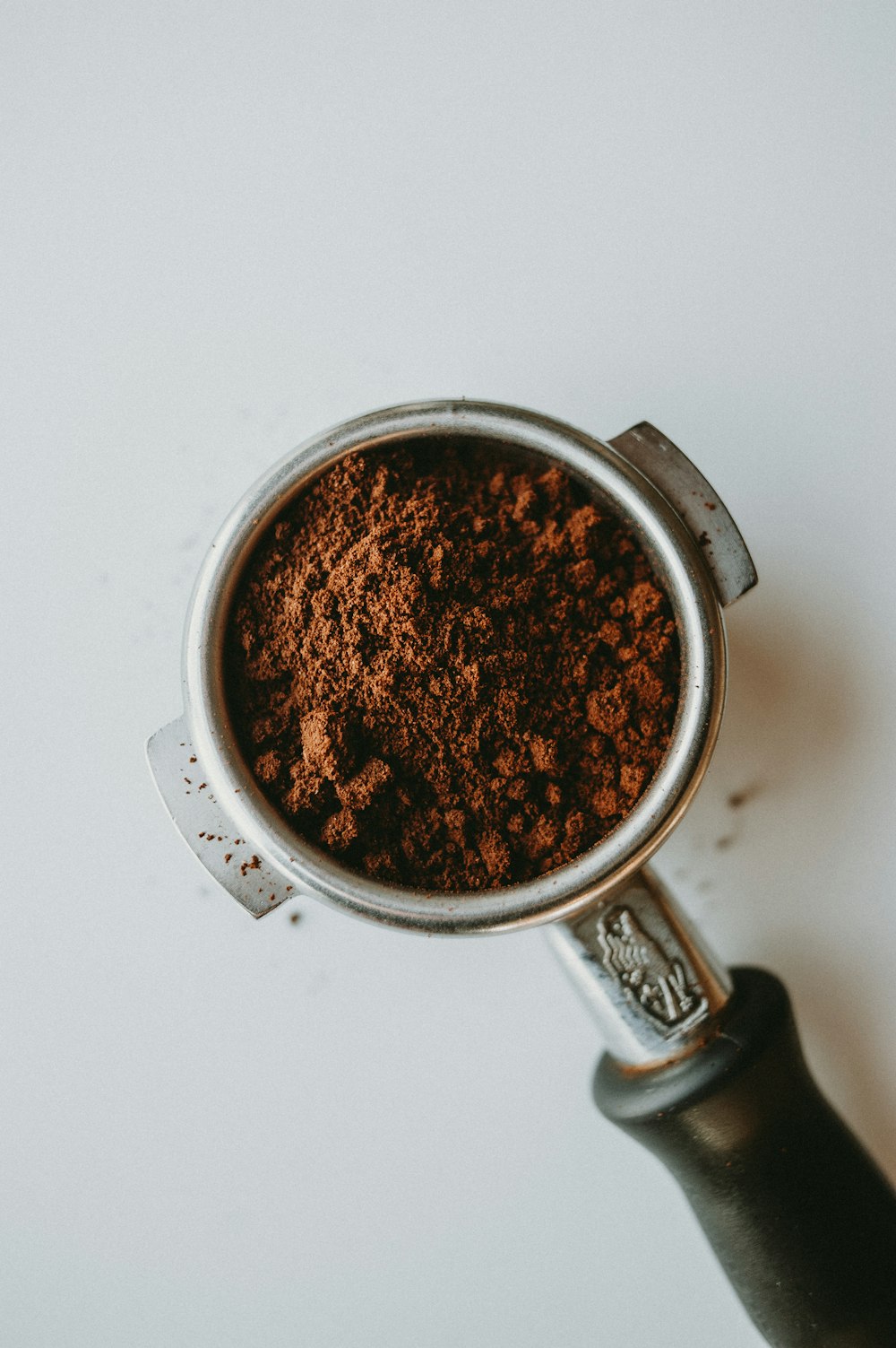 a close up of a cup of coffee on a table